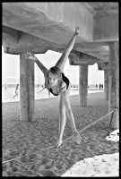 https://www.ed-templeton.com/files/gimgs/th-153_Girl balances on slackline HB pier V2.jpg
